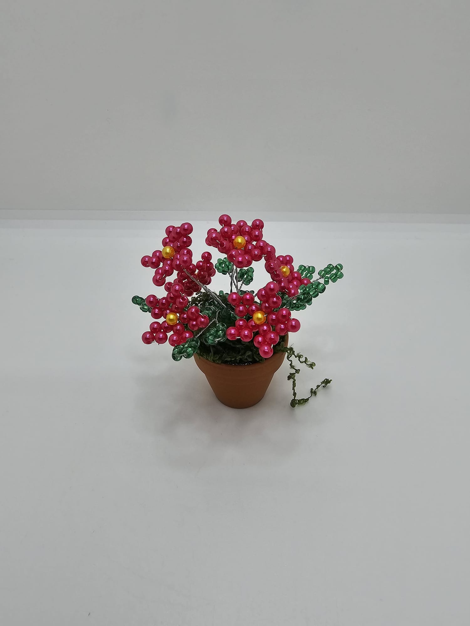 Magnet frigider flori rosii