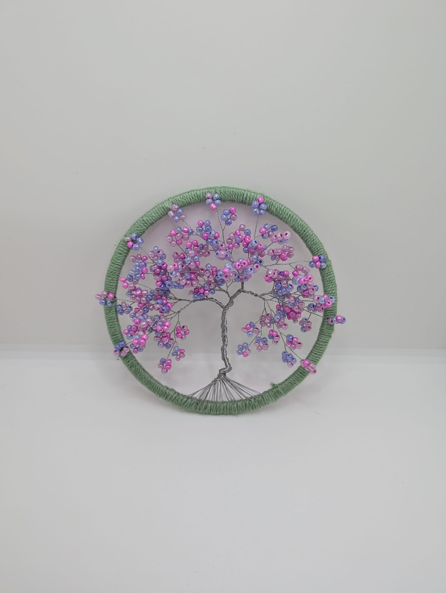Tree catcher roz pe cerc verde
